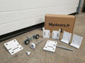 Kit de remplacement de quincaillerie pour porte sectionnelle